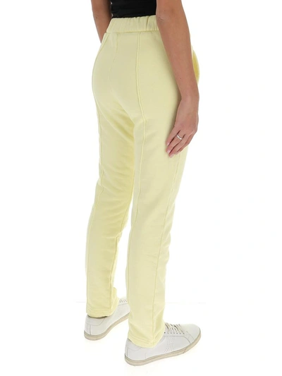 Shop Palm Angels Logo Embroidered Track Pants In Yellow