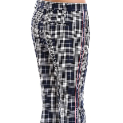 Shop Tommy Hilfiger Flared Check Trousers In Multi