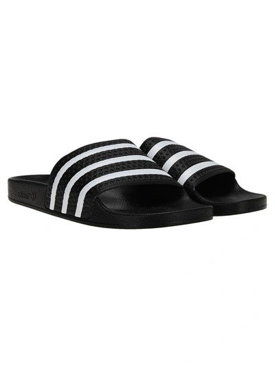 Shop Adidas Originals Adilette Slides In Black