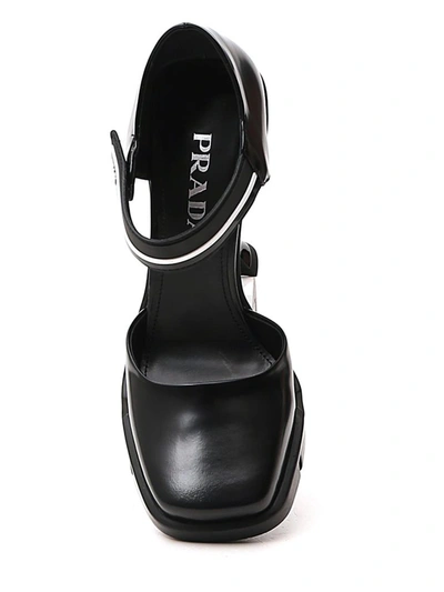 Shop Prada Square Toe Logo Strap Pumps In Black