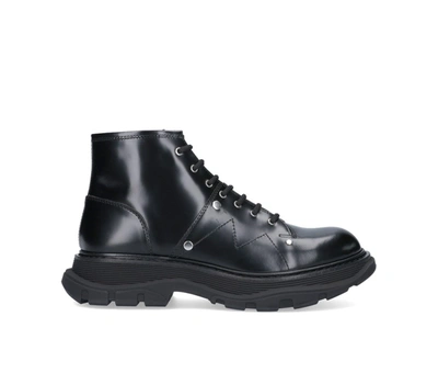 Shop Alexander Mcqueen Tread Lace Up Boots In Black