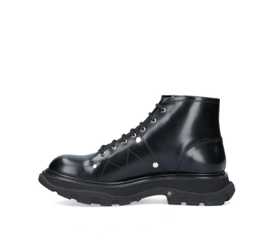 Shop Alexander Mcqueen Tread Lace Up Boots In Black