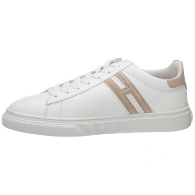 Shop Hogan Low Top Sneakers In White