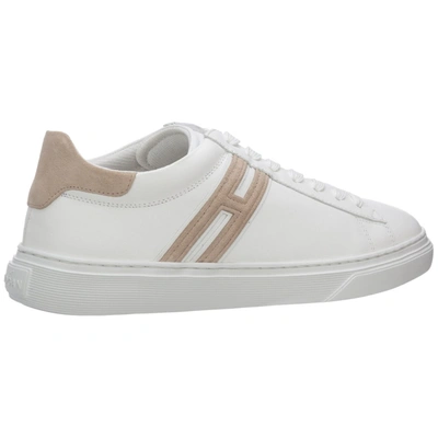 Shop Hogan Low Top Sneakers In White