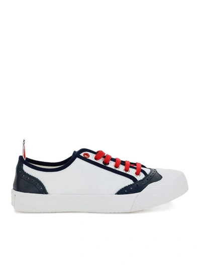 Shop Thom Browne Contrasting Piping Sneakers In White