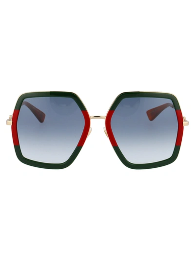 Shop Gucci Gg0106s Sunglasses In 007 Green Gold Grey