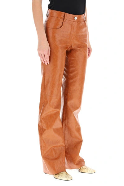 Shop Msgm Grained Faux Leather Trousers In Brown