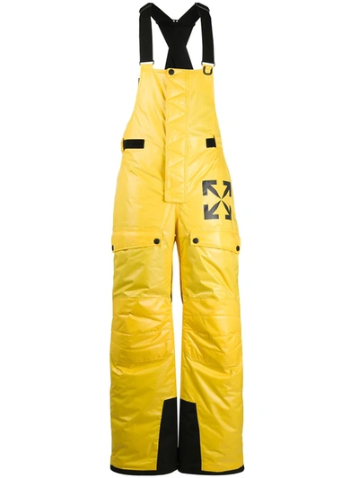 Yellow ski shop salopettes