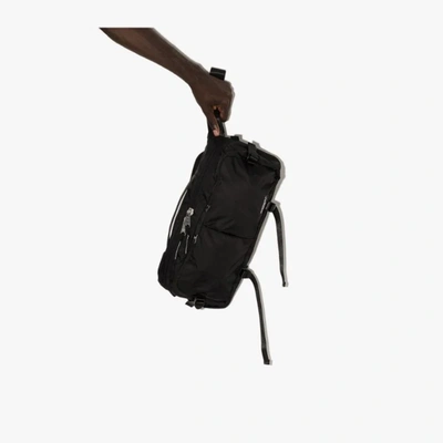 Shop Indispensable Black Snug Econyl Sling Backpack