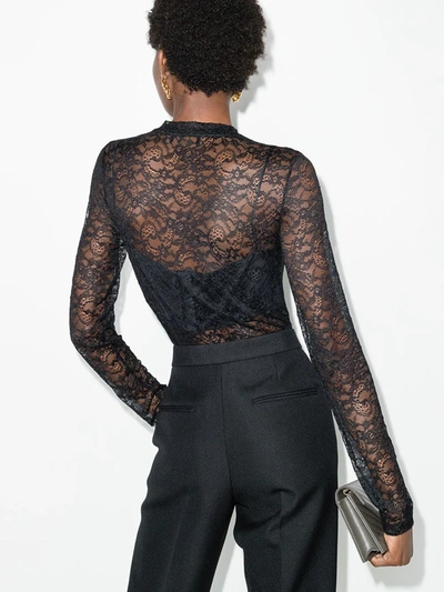 Shop Valentino Sheer Lace Bodysuit In Black