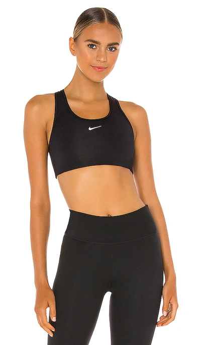 Shop Nike Swoosh Pad Sports Bra In Black & White