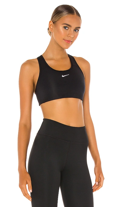 Shop Nike Swoosh Pad Sports Bra In Black & White