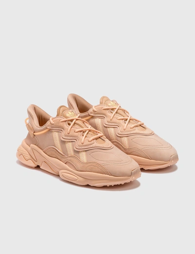 Shop Adidas Originals Ozweego In Glow Orange/orange Tint/flash Orange