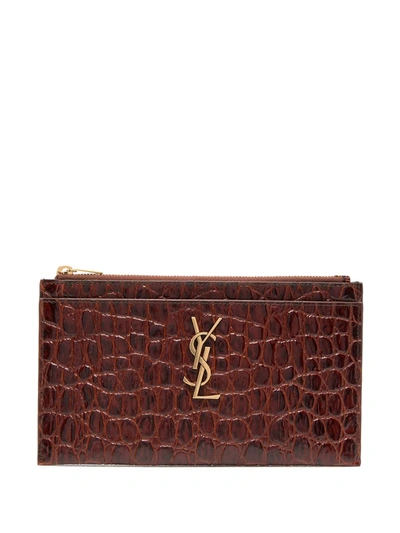 Shop Saint Laurent Crocodile Effect Monogram Clutch In Brown