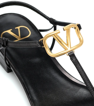 Shop Valentino Garavani Vlogo Leather Sandals In Nero Bianco