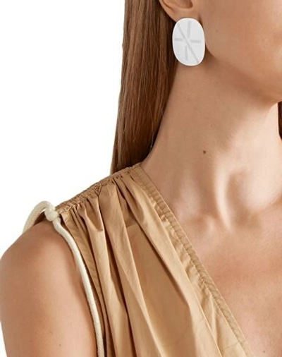 Shop Annie Costello Brown Earrings In Silver