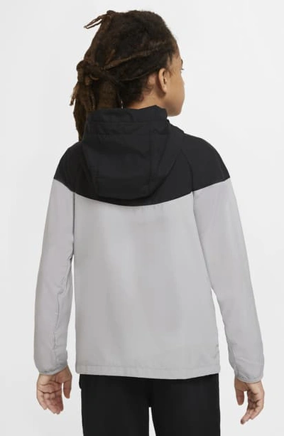 Shop Nike Kids' Sportswear Windrunner Jacket (big Boy) In Black/ Smoke Grey/ Crimson