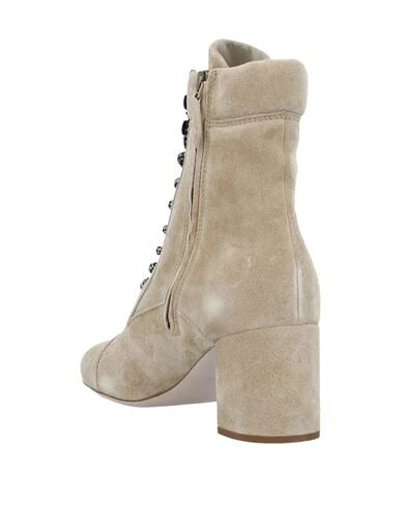 Shop Miu Miu Ankle Boots In Beige