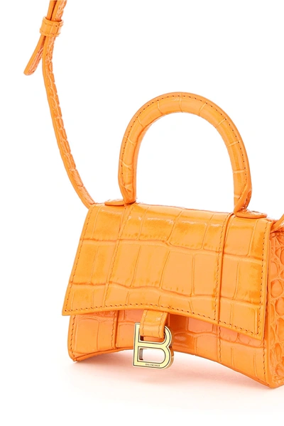Shop Balenciaga Hourglass Top Handle Mini Bag In Orange