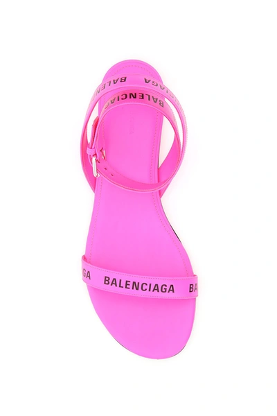 Shop Balenciaga Round Leather All Over Logo Sandals In Neon Pink