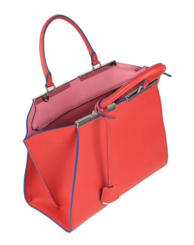 Shop Fendi Handbag In Red