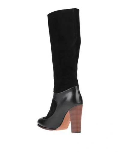 Shop Celine Boots In Black