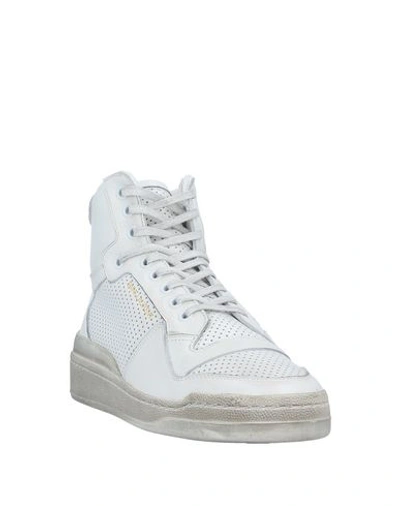 Shop Saint Laurent Sneakers In White