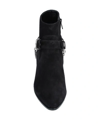 Shop Saint Laurent Ankle Boots In Black