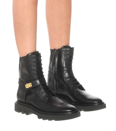 Shop Givenchy Eden Leather Combat Boots In Black