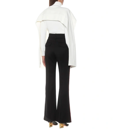 Shop Givenchy High-rise Flared Wool Pants In Black
