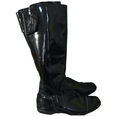 Pre-owned Dkny Patent Leather Boots In Black