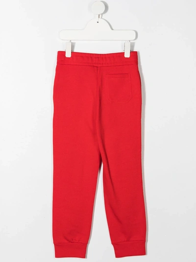 Balmain Embossed-logo Track Trousers In Red