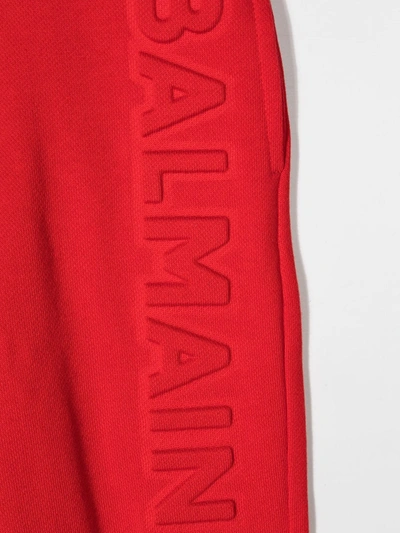 Balmain Embossed-logo Track Trousers In Red