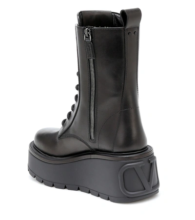 Shop Valentino Uniqueform Leather Combat Boots In Black