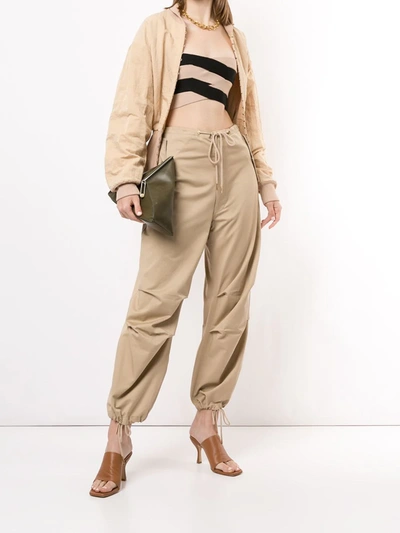 Shop Dion Lee Oversized Drawstring Trousers In Brown
