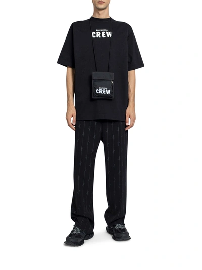Shop Balenciaga Pinstriped Trousers With Logo In Black