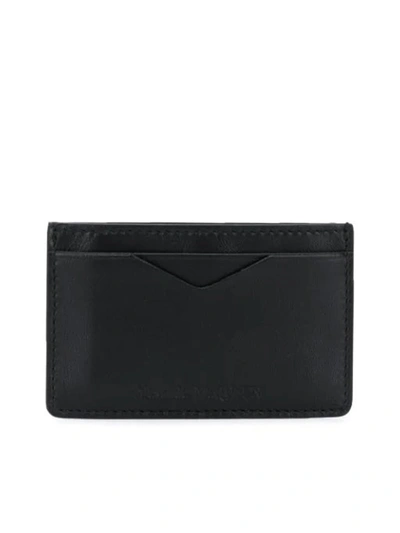 Shop Alexander Mcqueen Rib Cage Embossed Card Holder In Black