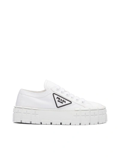 Shop Prada Triangular Logo Plaque Sneakers In White