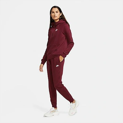 Shop Nike Women's Sportswear Essential Jogger Pants In Purple