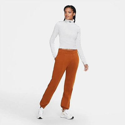 Shop Nike Women's Sportswear Essential Fleece Jogger Pants In Orange