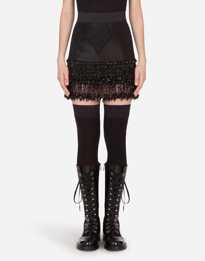 Shop Dolce & Gabbana Embroidered Lace Miniskirt In Black