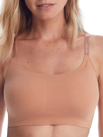 Shop Calvin Klein Invisibles Comfort Bralette In Light Chestnut