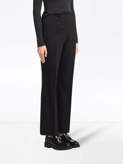Shop Prada Bow-detail Trousers In Black