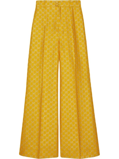 Shop Gucci Gg Lamé Wide Leg Trousers In Yellow