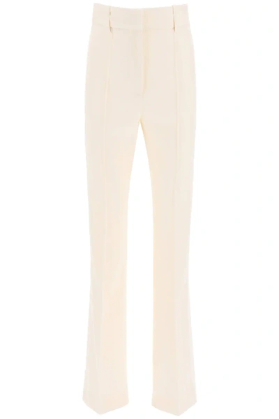 Shop Givenchy Flare Wool Pants In Beige