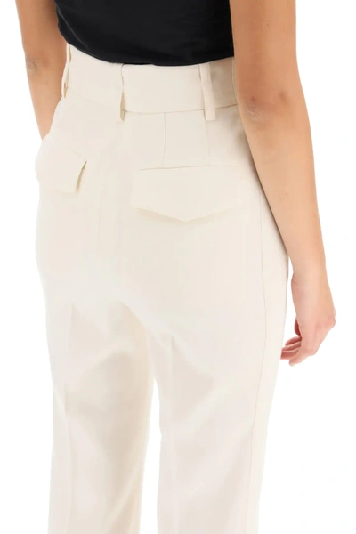 Shop Givenchy Flare Wool Pants In Beige