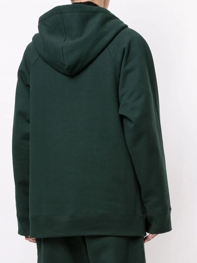 Shop Undercover Asymmetric Drawstring Hoodie In Green