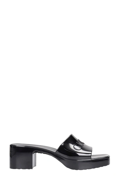 Shop Gucci Slider Logo Sandals In Black Rubber/plasic