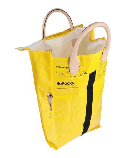 Shop Aalto Handbags In Yellow