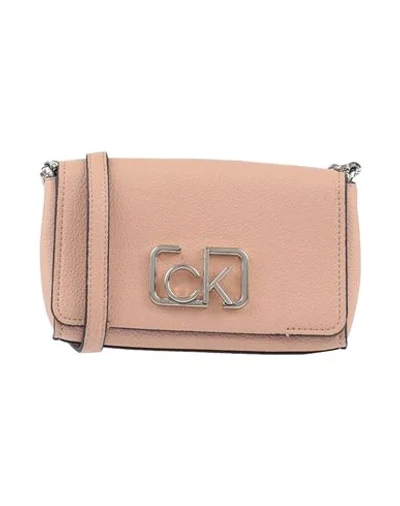 Shop Calvin Klein Handbags In Beige